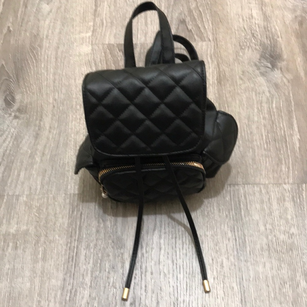 Claire’s • mini backpack